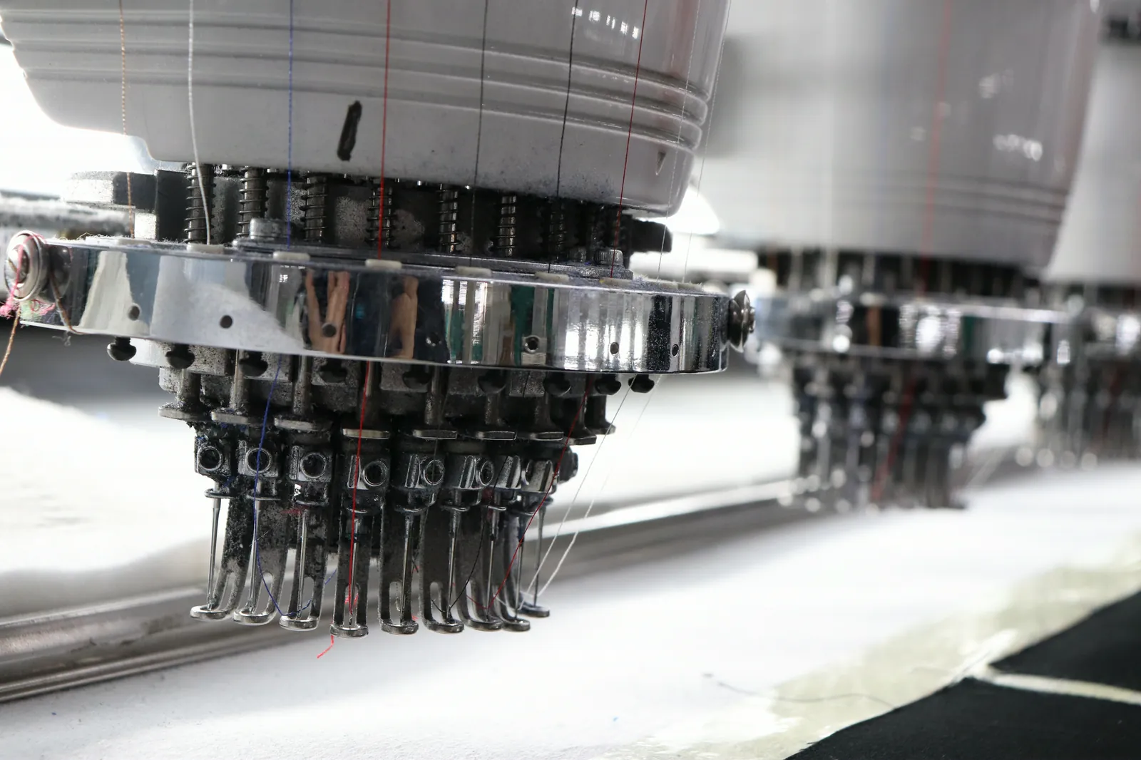 Computerized embroidery needles in operation