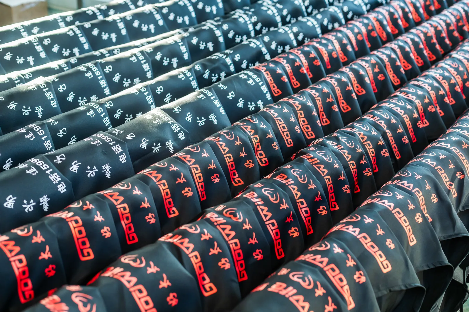 Rows of finished embroidered caps